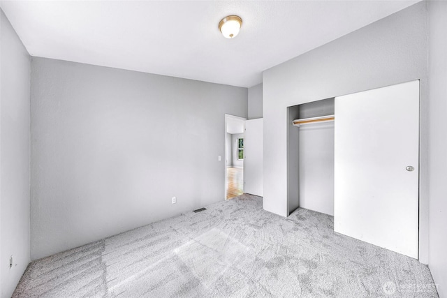 4949 Samish Way Unit 17, Bellingham, WA 98229 - unfurnished bedroom featuring carpet flooring and a closet
