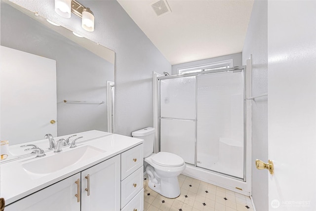 4949 Samish Way Unit 17, Bellingham, WA 98229 - bathroom featuring toilet, a stall shower, vanity, and lofted ceiling