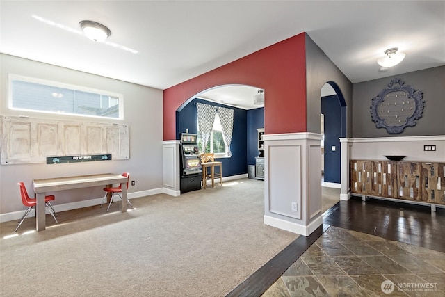 22306 137th Ave E, Graham, WA 98338 - interior space featuring arched walkways, baseboards, and wood finished floors