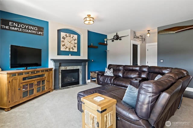 22306 137th Ave E, Graham, WA 98338 - carpeted living room featuring a fireplace and baseboards