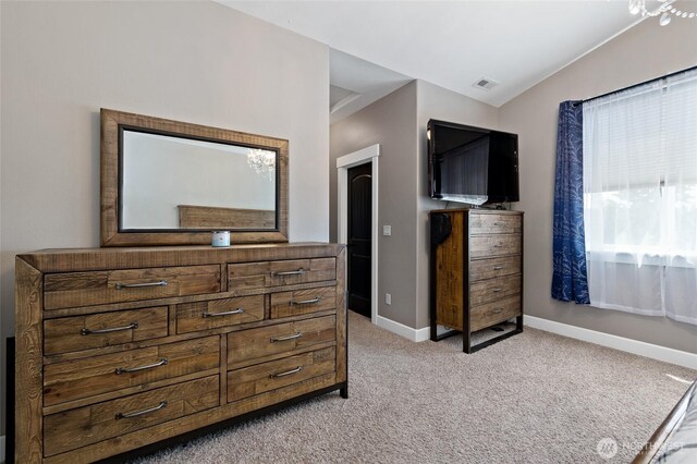 22306 137th Ave E, Graham, WA 98338 - bedroom featuring light colored carpet, vaulted ceiling, and baseboards