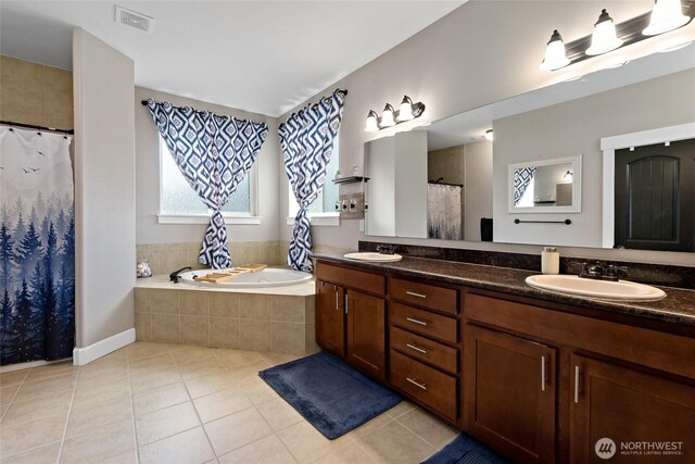 22306 137th Ave E, Graham, WA 98338 - bathroom with double vanity, tile patterned flooring, a garden tub, and a shower with curtain