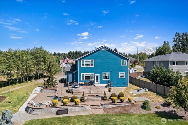22306 137th Ave E, Graham, WA 98338 - rear view of house with a wooden deck