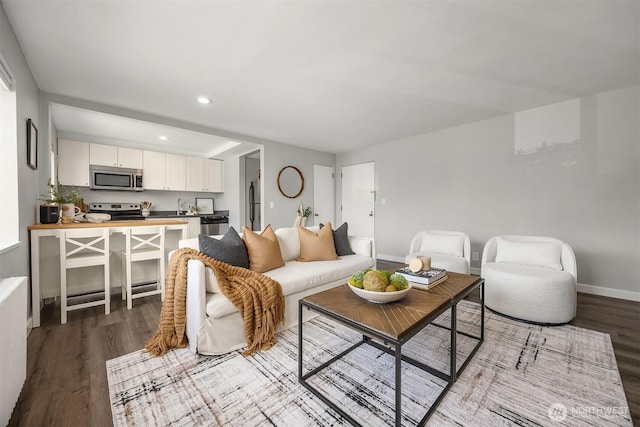 1800 Taylor Ave N Unit 1, Seattle, WA 98109 - living room with light wood-style floors, baseboards, and recessed lighting