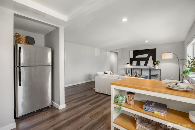 1800 Taylor Ave N Unit 1, Seattle, WA 98109 - living area featuring dark wood-style flooring, recessed lighting, and baseboards