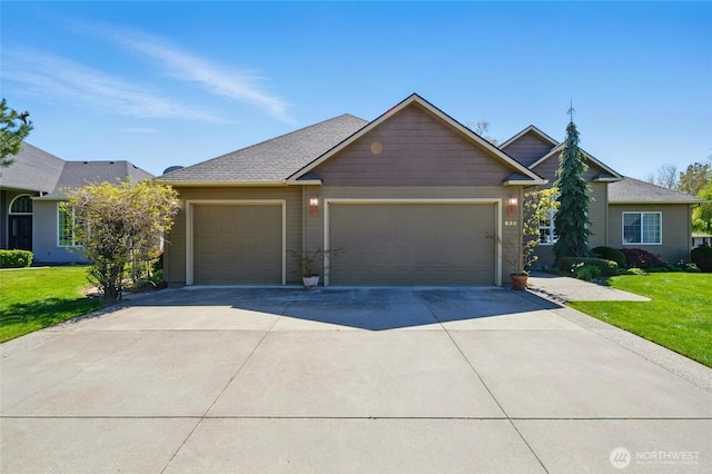 832 SE Vintage Way, College Place, WA 99324 - view of front facade featuring concrete driveway, an attached garage, and a front lawn