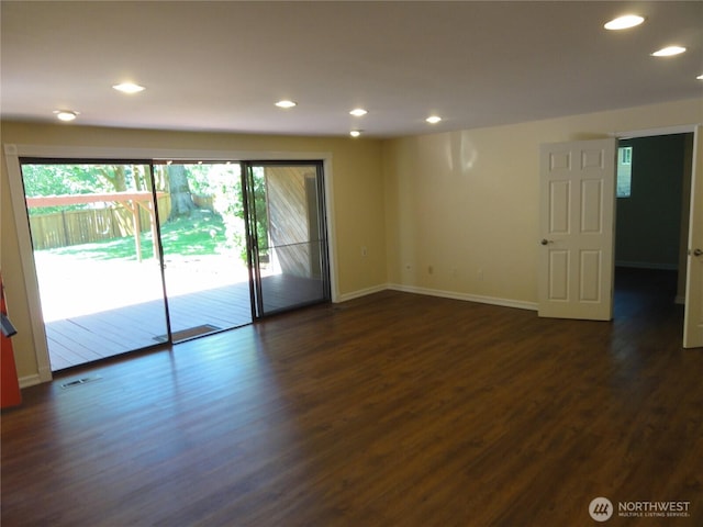 1242 Lidstrom Rd E, Port Orchard, WA 98366 - empty room featuring dark wood-style floors, baseboards, and recessed lighting