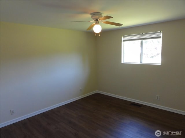 1242 Lidstrom Rd E, Port Orchard, WA 98366 - empty room featuring wood finished floors, baseboards, and a ceiling fan