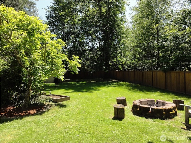 1242 Lidstrom Rd E, Port Orchard, WA 98366 - view of yard with an outdoor fire pit