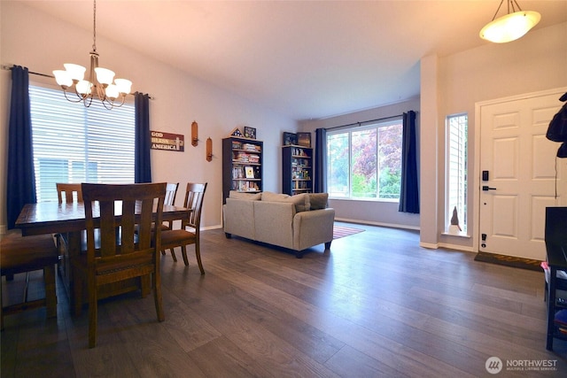 15437 104th Way SE, Yelm, WA 98597 - dining room featuring a chandelier and dark wood-style flooring