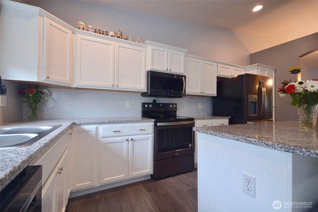 15437 104th Way SE, Yelm, WA 98597 - kitchen featuring black appliances, white cabinetry, dark wood finished floors, decorative backsplash, and recessed lighting
