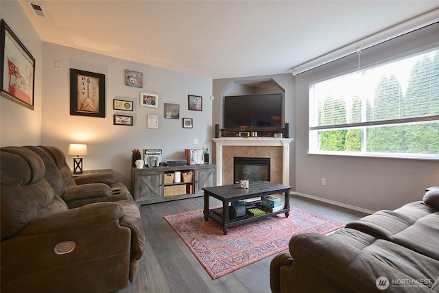 15437 104th Way SE, Yelm, WA 98597 - living area with wood finished floors and a tiled fireplace