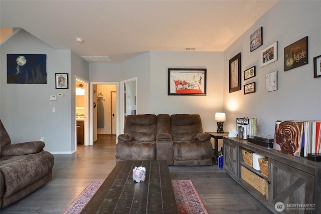 15437 104th Way SE, Yelm, WA 98597 - living room featuring dark wood-type flooring and baseboards