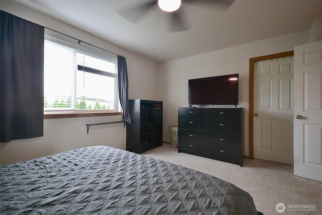 15437 104th Way SE, Yelm, WA 98597 - bedroom featuring light carpet and a ceiling fan