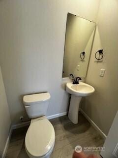 12080 127th Avenue Ct E Unit 73, Puyallup, WA 98374 - half bath featuring toilet and baseboards