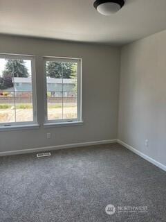 12080 127th Avenue Ct E Unit 73, Puyallup, WA 98374 - empty room with baseboards and carpet