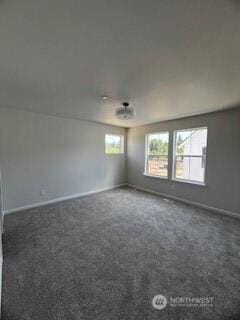 12080 127th Avenue Ct E Unit 73, Puyallup, WA 98374 - empty room featuring baseboards and carpet flooring