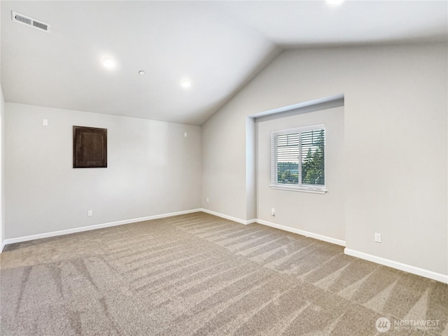4339 S 160th St, Tukwila, WA 98188 - empty room with vaulted ceiling, carpet flooring, and recessed lighting