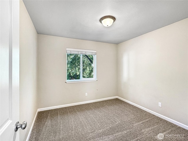 4339 S 160th St, Tukwila, WA 98188 - spare room featuring carpet flooring and a textured ceiling