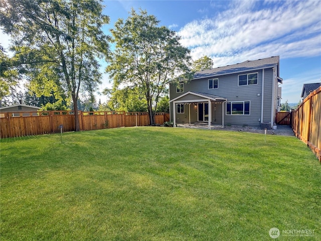 4339 S 160th St, Tukwila, WA 98188 - rear view of house featuring a fenced backyard and a patio area
