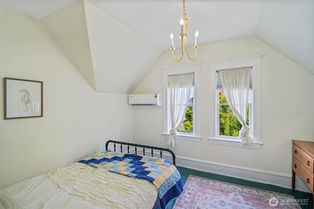 5060 E State Route 106, Union, WA 98592 - bedroom featuring a wall unit AC, lofted ceiling, and baseboards