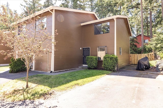 111 NW Columbia Dr Unit B7, Oak Harbor, WA 98277 - view of front of home featuring driveway and an attached garage
