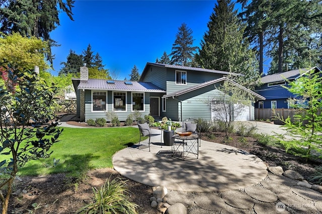 3222 107th Ave SE, Bellevue, WA 98004 - back of house with a chimney, an attached garage, metal roof, and a patio