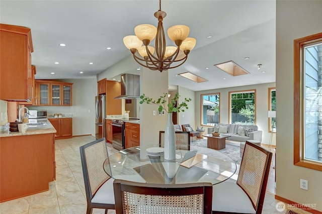 3222 107th Ave SE, Bellevue, WA 98004 - dining room with a chandelier, baseboards, and recessed lighting