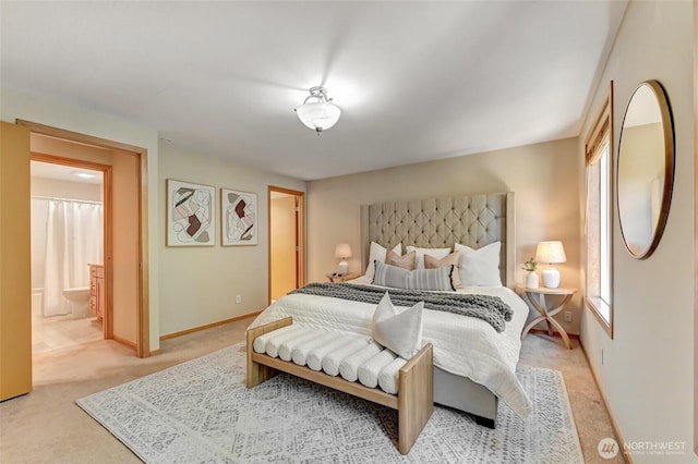 3222 107th Ave SE, Bellevue, WA 98004 - bedroom with light carpet, baseboards, and ensuite bathroom