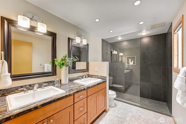 3222 107th Ave SE, Bellevue, WA 98004 - full bath featuring toilet, double vanity, a walk in shower, tile patterned floors, and recessed lighting