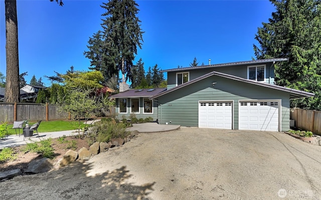 3222 107th Ave SE, Bellevue, WA 98004 - traditional-style house with driveway and a chimney