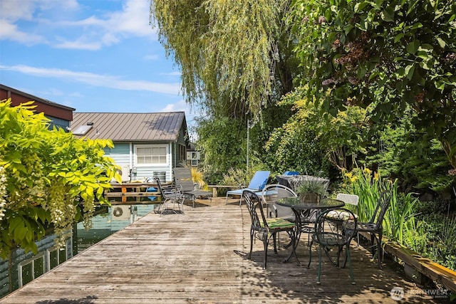 2031 Fairview Ave E Unit E, Seattle, WA 98102 - wooden terrace with outdoor dining area