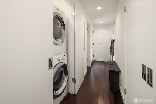 2031 Fairview Ave E Unit E, Seattle, WA 98102 - washroom with stacked washing machine and dryer, recessed lighting, dark wood finished floors, and baseboards