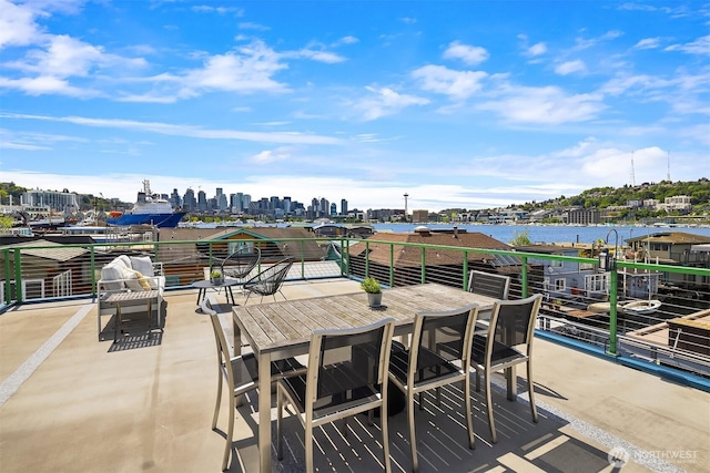 2031 Fairview Ave E Unit E, Seattle, WA 98102 - view of patio with a water view and a view of skyline