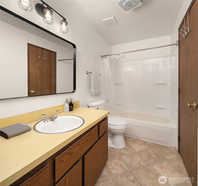 16817 21st Ave E, Spanaway, WA 98387 - bathroom with vanity, toilet, and shower / bath combo