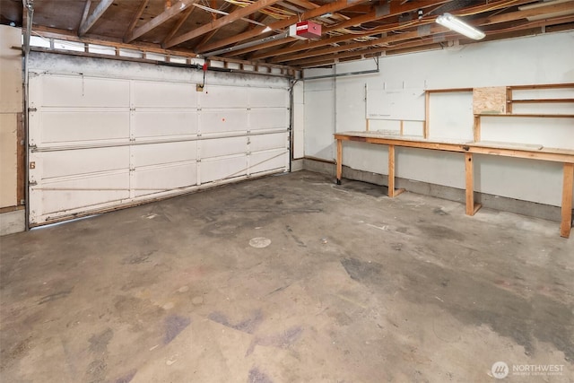 16817 21st Ave E, Spanaway, WA 98387 - garage featuring a workshop area