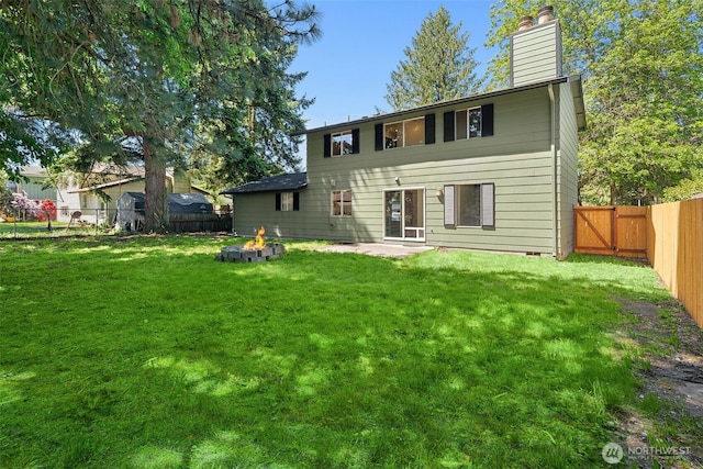 16817 21st Ave E, Spanaway, WA 98387 - rear view of property featuring a chimney and crawl space
