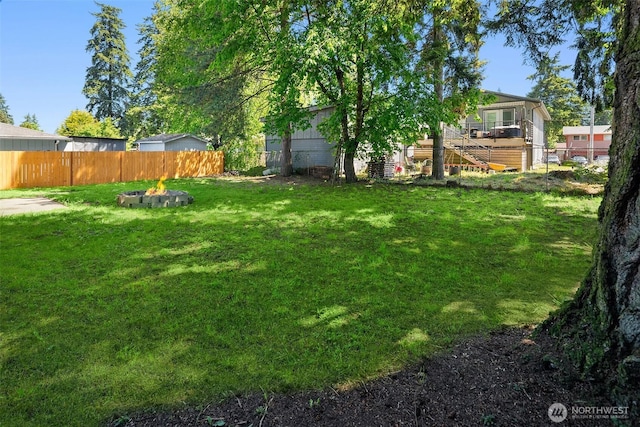 16817 21st Ave E, Spanaway, WA 98387 - view of yard featuring an outdoor fire pit