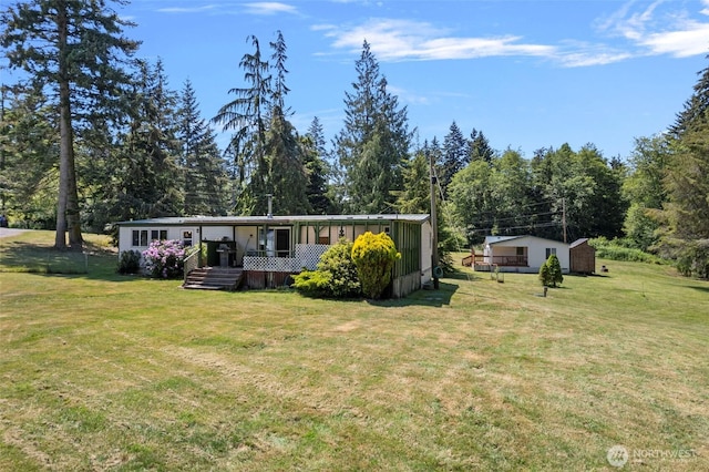 1269 Hideaway Ln, Oak Harbor, WA 98277 - manufactured / mobile home featuring a front lawn and covered porch