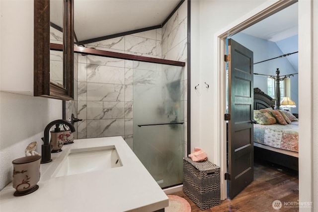 15329 Mckee Ln SE, Yelm, WA 98597 - ensuite bathroom with wood finished floors, a stall shower, and vanity
