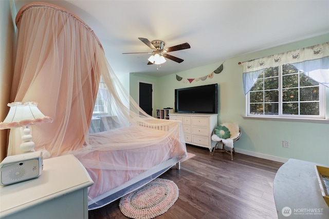 15329 Mckee Ln SE, Yelm, WA 98597 - bedroom with baseboards, dark wood-type flooring, and ceiling fan