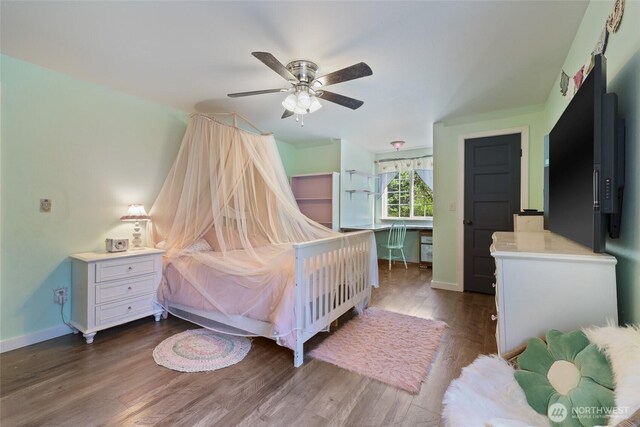 15329 Mckee Ln SE, Yelm, WA 98597 - bedroom with baseboards, dark wood-type flooring, and ceiling fan
