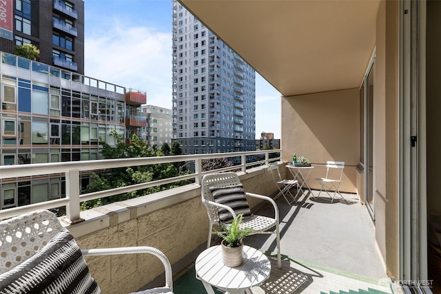 2600 2nd Ave Unit 504, Seattle, WA 98121 - balcony featuring a view of city