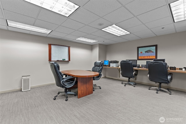2600 2nd Ave Unit 504, Seattle, WA 98121 - office area featuring carpet floors, baseboards, and a paneled ceiling