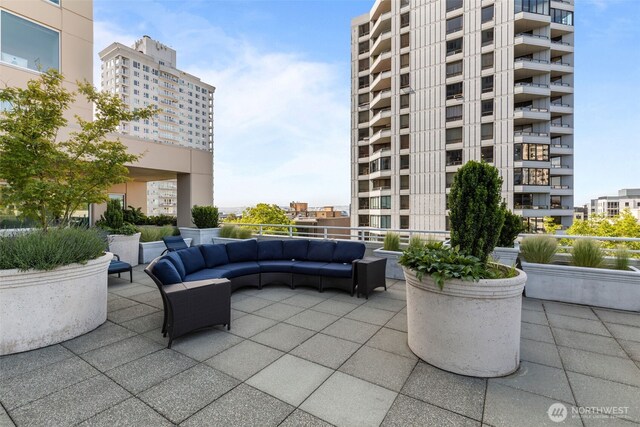 2600 2nd Ave Unit 504, Seattle, WA 98121 - view of patio / terrace with an outdoor living space