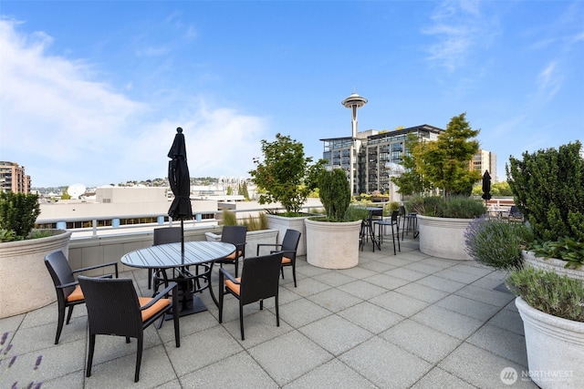 2600 2nd Ave Unit 504, Seattle, WA 98121 - view of patio / terrace featuring outdoor dining space