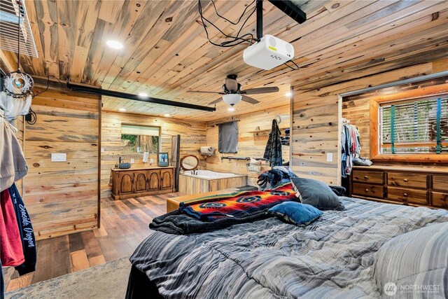 214 Inglewood Dr, Longview, WA 98632 - bedroom with wood walls, wooden ceiling, wood-type flooring, and recessed lighting
