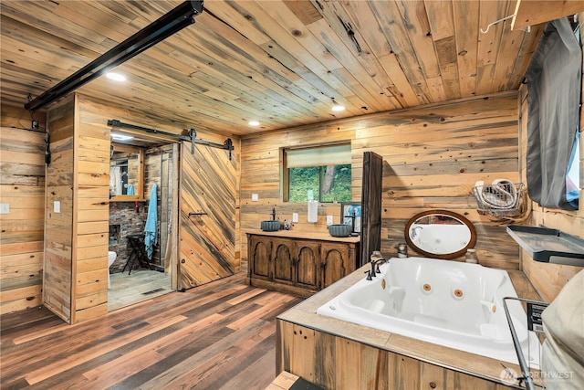 214 Inglewood Dr, Longview, WA 98632 - full bathroom featuring wooden ceiling, wood walls, a whirlpool tub, vanity, and wood finished floors