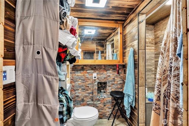 214 Inglewood Dr, Longview, WA 98632 - bathroom featuring toilet, wooden ceiling, and wood walls