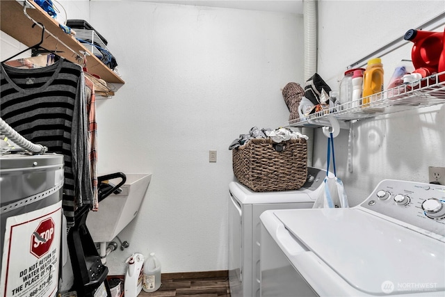 214 Inglewood Dr, Longview, WA 98632 - laundry area with separate washer and dryer, wood finished floors, and baseboards